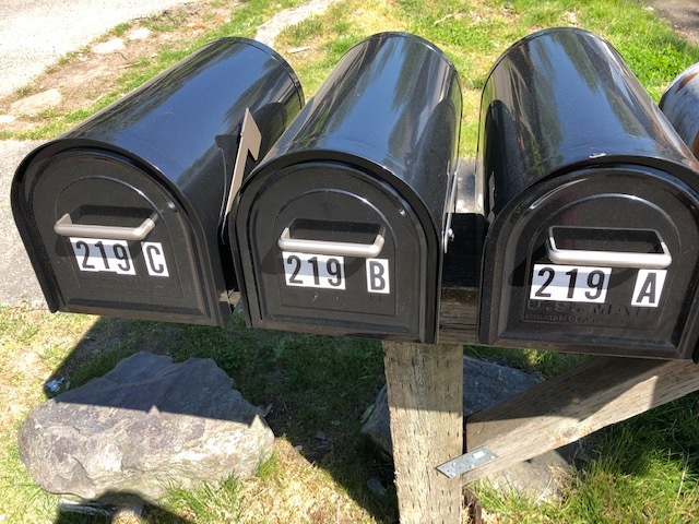 Mailboxes are secured with a mailbox key. - 219 36th E St