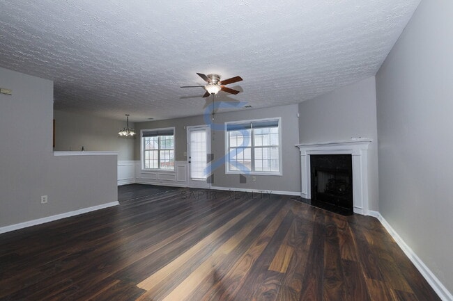 Building Photo - Move in before January 31st and choose your reward: a $250 Amazon Gift Card or a 55" Smart TV!