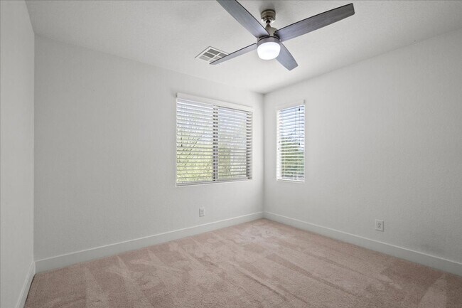 Building Photo - Modern Gated 3 Bedroom Retreat with Loft & Entertainer’s Backyard