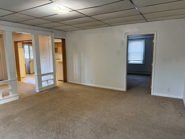 living room looking toward dining, kitchen and bedroom - 22 N Maple Ave