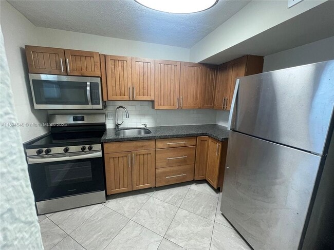 Building Photo - 4255 N University Dr