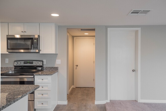 Building Photo - Remodeled home! Granite! SS Appliances!