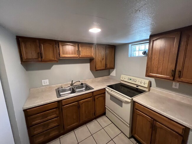 Building Photo - Four Bed Two Bath, Two Kitchen Home Just B...