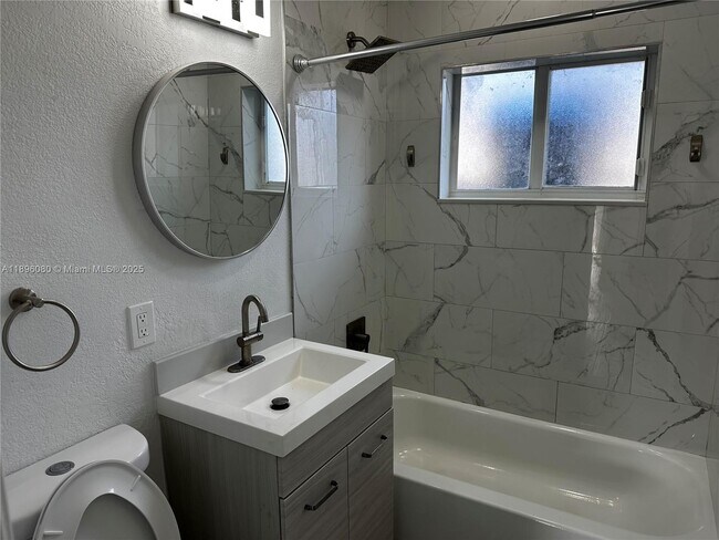 Building Photo - 6844 NW 5th Ave