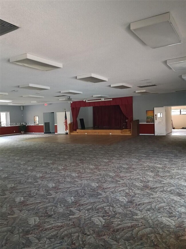 Building Photo - 6090 N Sabal Palm Blvd