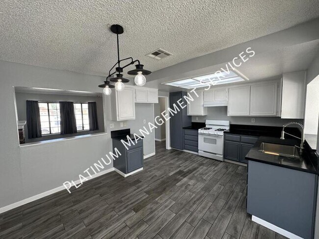 Building Photo - 4206 E Ave Q14