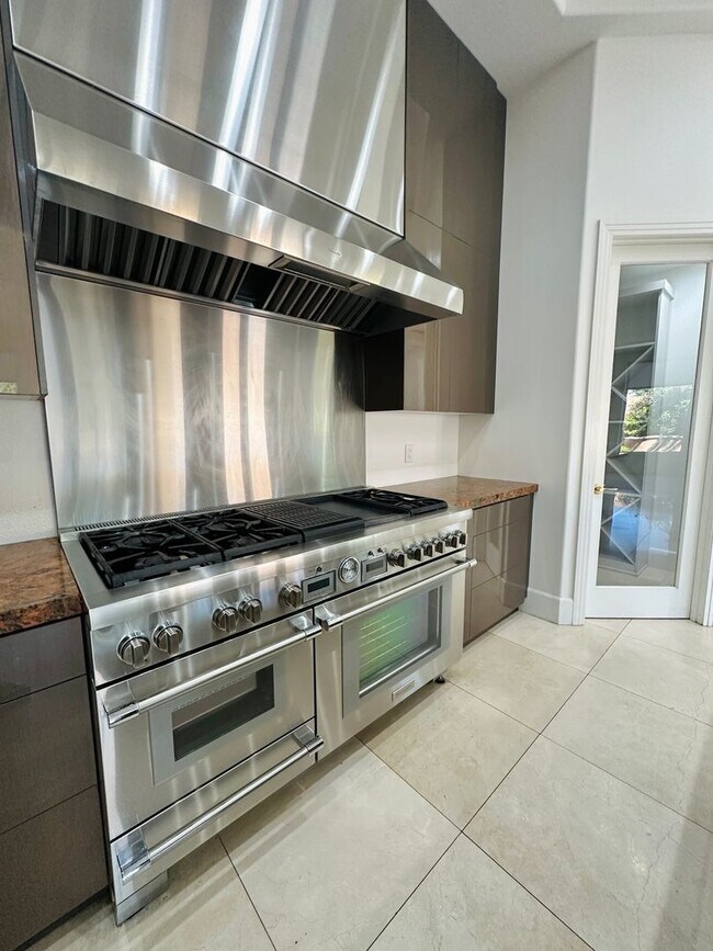 Building Photo - Stunning home with pool in prestigious Eagle Hills!