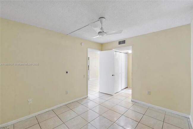 Building Photo - 9091 Lime Bay Blvd