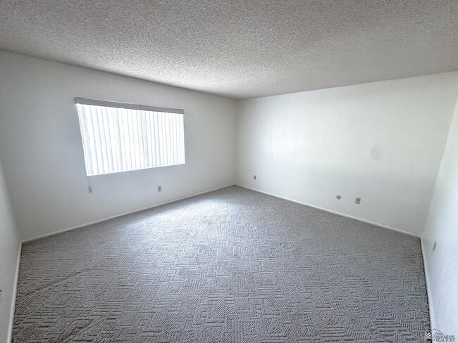 Building Photo - 10476 S Del Montes