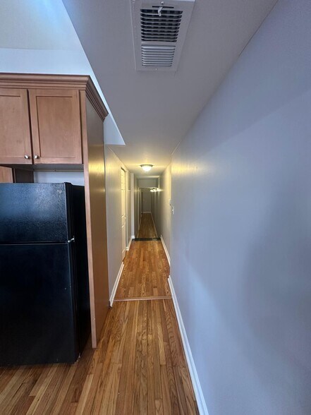 View of hallway to laundry, bedrooms, and bathroom - 1426 Madison Ave