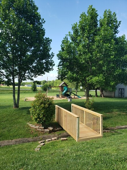 Bridge to play area - Excelsior Gardens Apartments