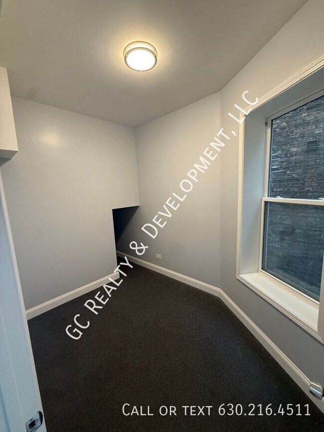 Building Photo - 6433 S Vernon Ave