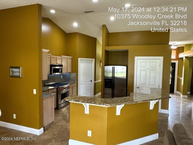 Building Photo - 10375 Woodley Creek Blvd