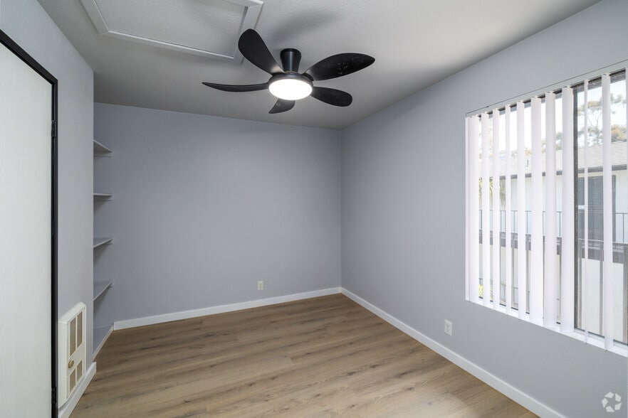 Seagrass - Remodeled Bedroom - Salt & Vine Oceanside Apartments