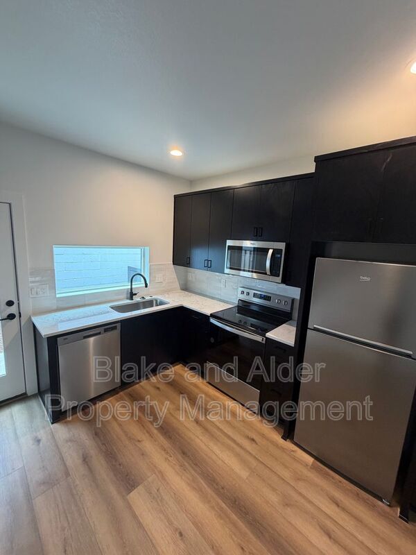 Building Photo - 3522 NE 44th Ave