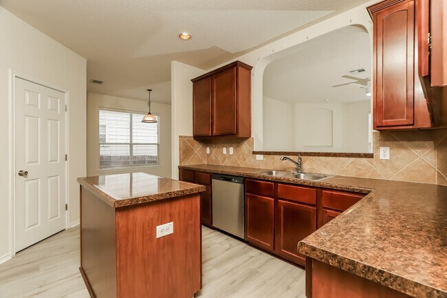 Building Photo - Spacious & Sun-Filled 4BR Retreat with Open-Concept Living and Versatile Dual Living Areas