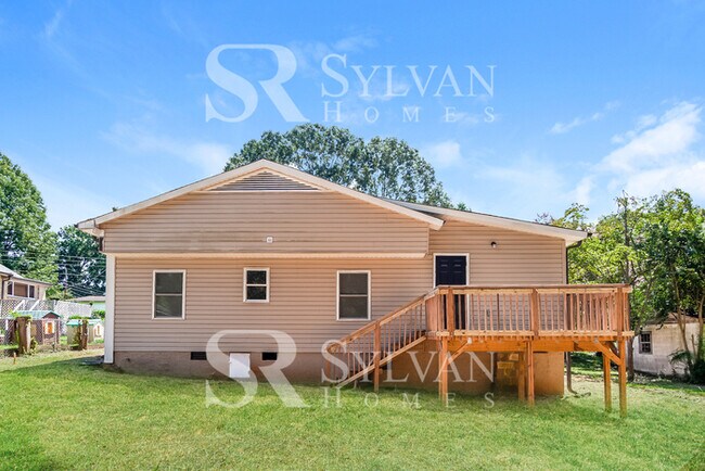 Building Photo - Turn the key. Enter. Smile. Repeat every day!