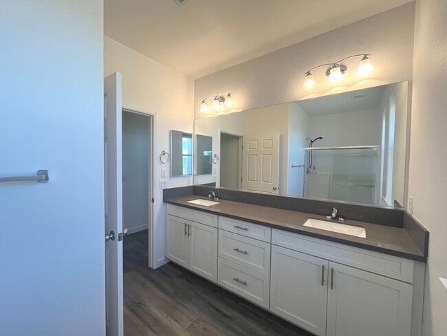 Building Photo - Single-story 1326 sq ft, townhome built in 2019 w/3 bed, 2 bath & spacious attached 2-car garage ...
