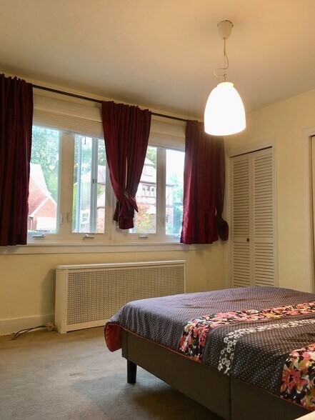 master bedroom with large windows - 5463 Fair Oaks St