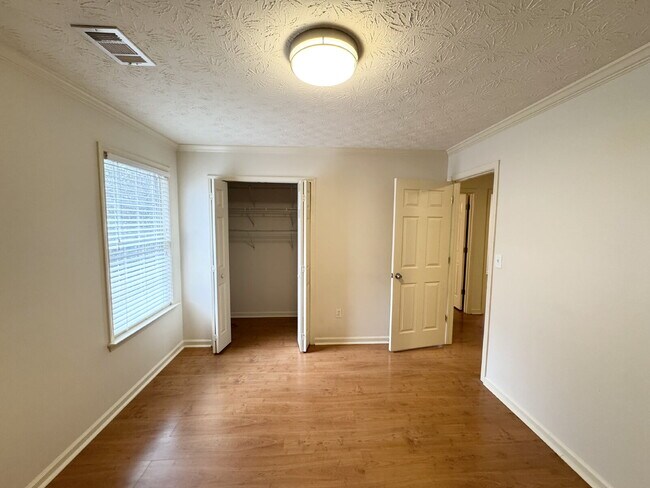 Building Photo - Rare Sugar Hill Rental with Huge Fenced Yard and Outdoor Living Space