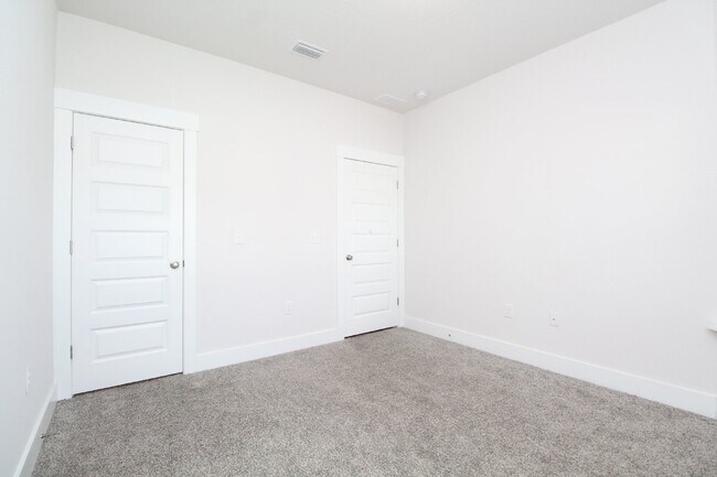 Building Photo - 3BR/2BA Cantonment New Construction Townhome with 2-Car Garage, Granite Kitchen & Low-Maintenance...