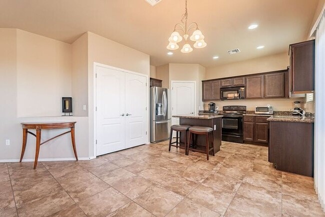 Building Photo - Spacious 3-Bed, 2.5-Bath Tucson Condo w/ G...