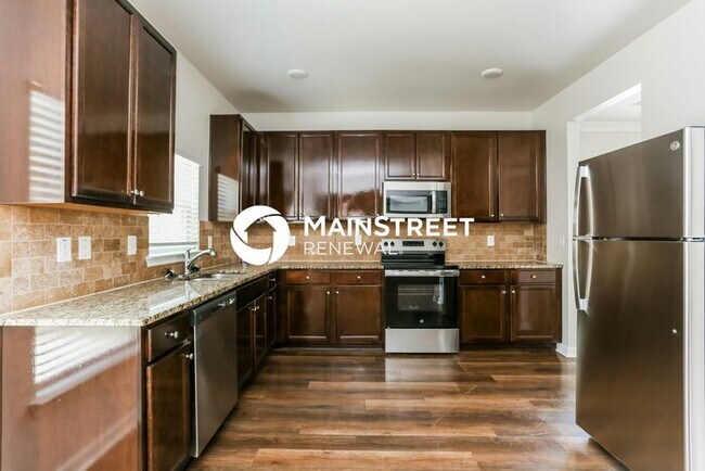 Building Photo - 5 Bedroom Pet-Friendly Home in STOCKBRIDGE, GA with Main Street Renewal