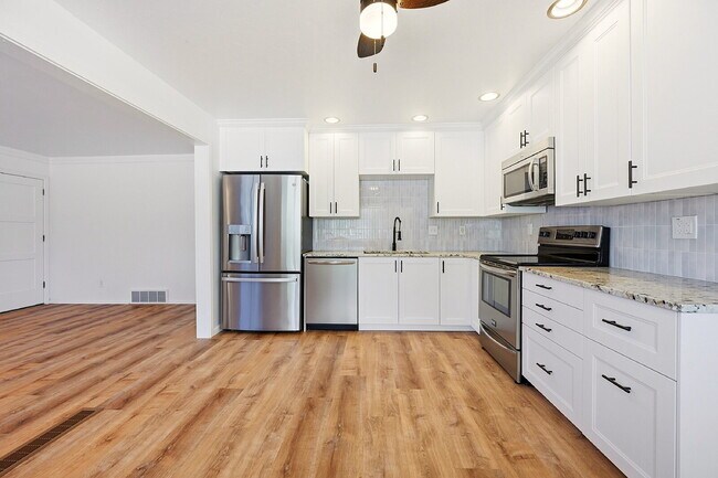 Building Photo - $2,795.95- 4 Bed, 2 Bath Home in Arvada with In-Unit Laundry and Fenced Yard!