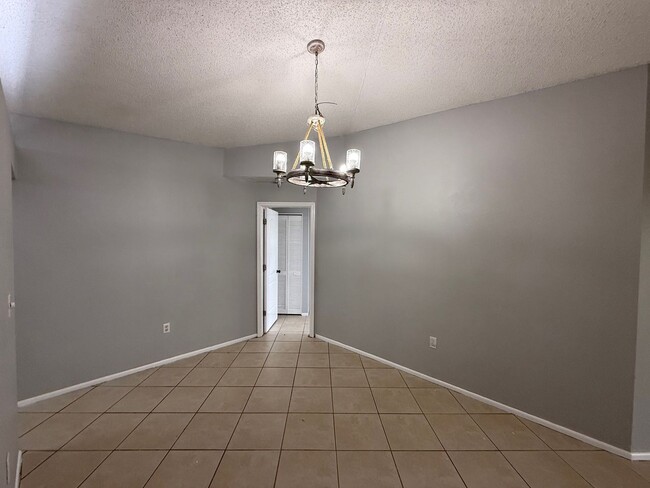 Building Photo - Centrally located 3/2 with 2 car garage. Pet friendly. Lawncare included.
