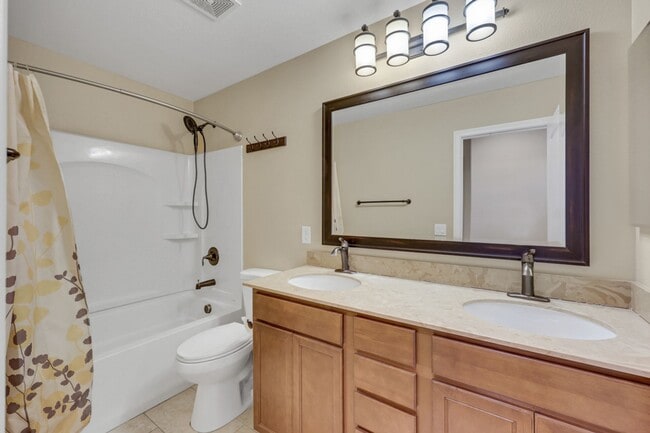 Building Photo - Southern Highlands: Spacious 4-Bedroom Home in a Gated Community with Upstairs Loft, Private Back...
