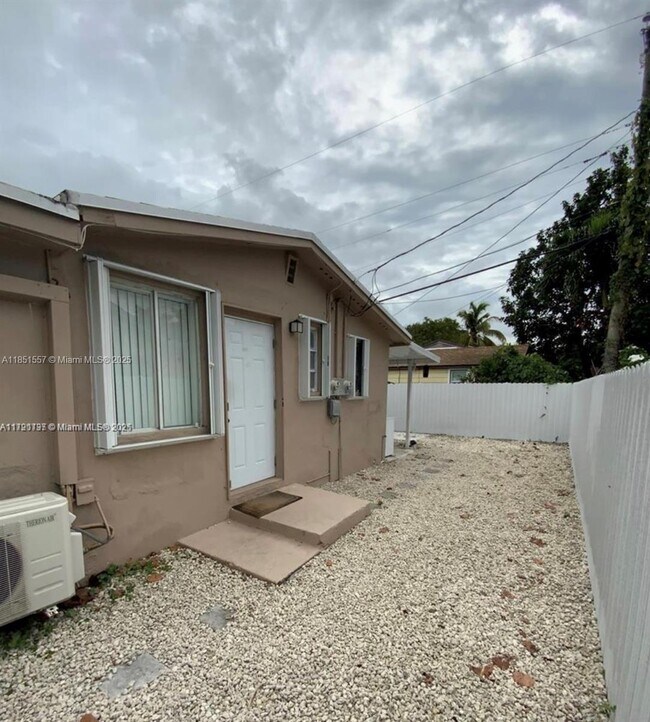 Building Photo - 1064 NW 103rd St