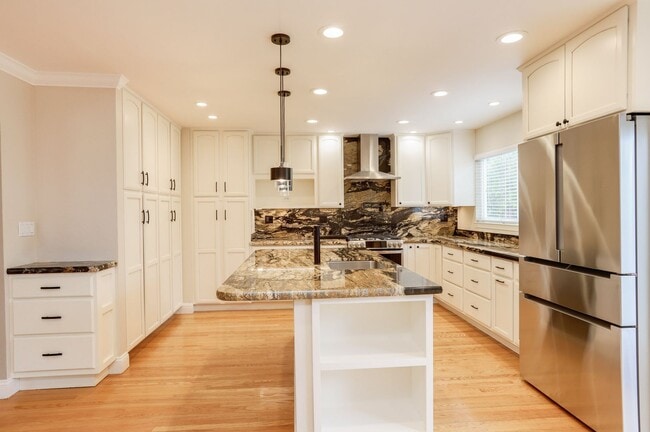 Building Photo - 4BR/3.5BA Belmont Home with Multiple Ensuite Bedrooms, A/C & 2-Car Garage | YouTube Tour