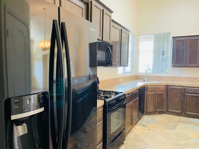 Building Photo - 9415 Godiva Ave