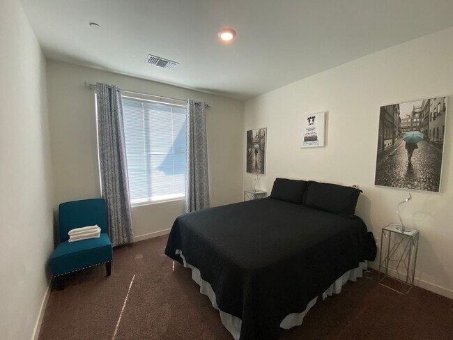 Building Photo - Welcome to the Best Deal in Town. Fully furnished 4 BD 2 BA house on a corner lot