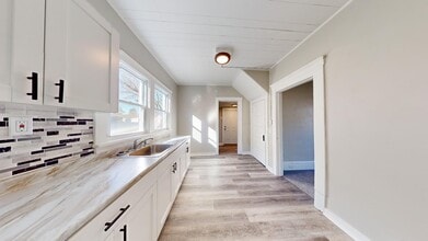 Building Photo - 7408 Dudley Ave