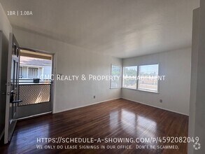 Building Photo - 4841 1/2 Clark Ave-