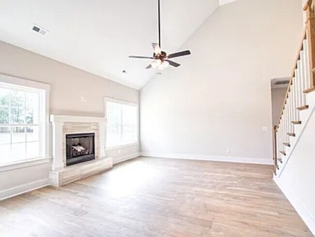 Building Photo - Situated on over 3 acres right in a growin...