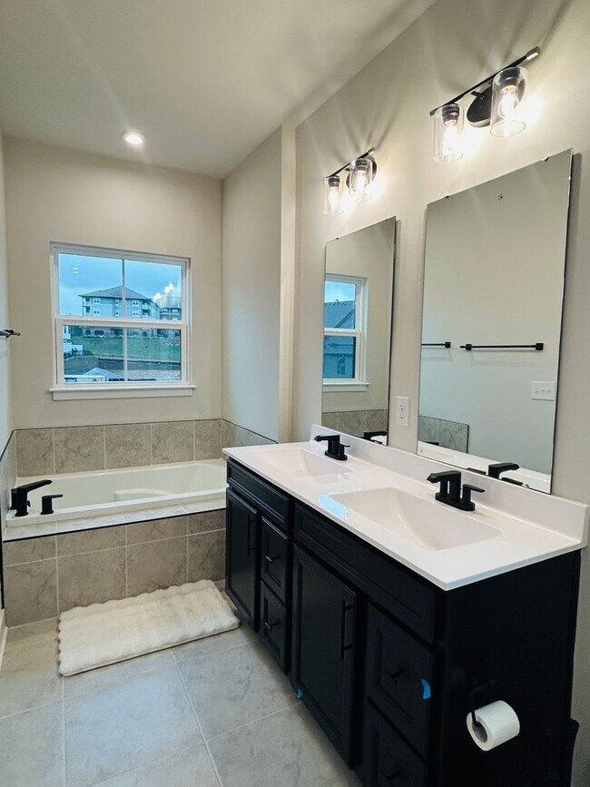 Building Photo - New Construction • 4 BR • 2 Full / 2 Half BA • End Unit Townhome in Village Town – Fayetteville’s...