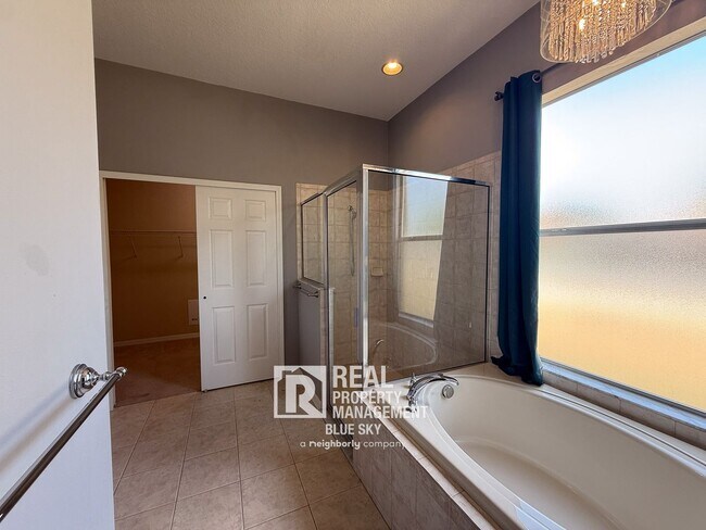 Building Photo - Executive Home with Custom Finishes in Gat...