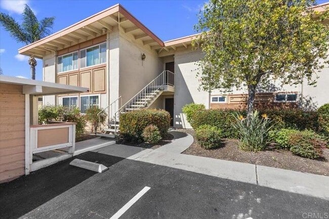 Building Photo - Poolside Living at Its Finest – Turnkey 3BR Condo with Direct Patio Access to the Pool