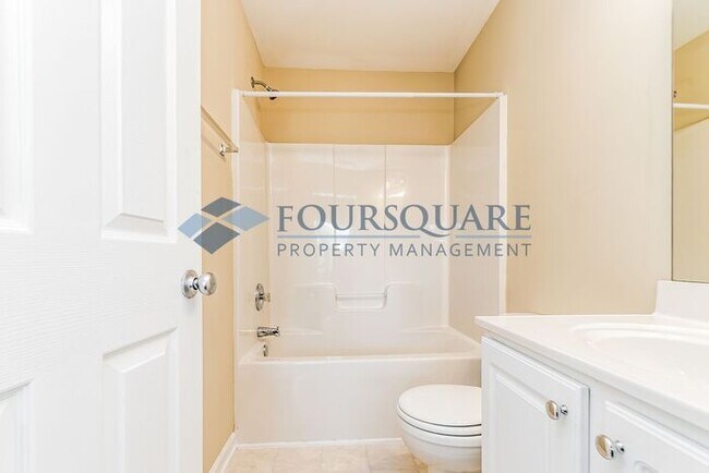 Building Photo - Spacious 2-Bed / 3.5-Bath Townhome with Hardwood Floors, Lower-Level Bonus Room & Private Outdoor...