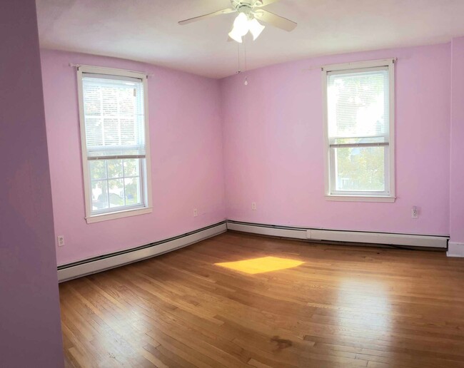 Bedroom with ceiling fan - 25 Boylston St