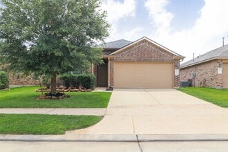 Building Photo - 24423 Raindrop Poppy Dr