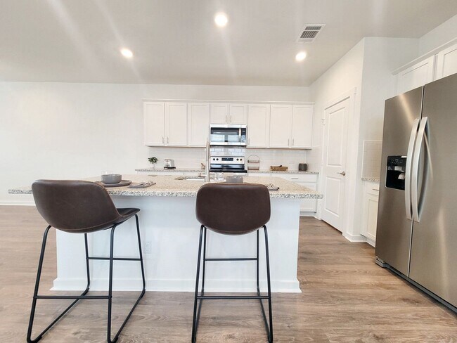 Building Photo - Spacious 4/BR 2.5/BA Retreat with Fenced Yard and Smart Features