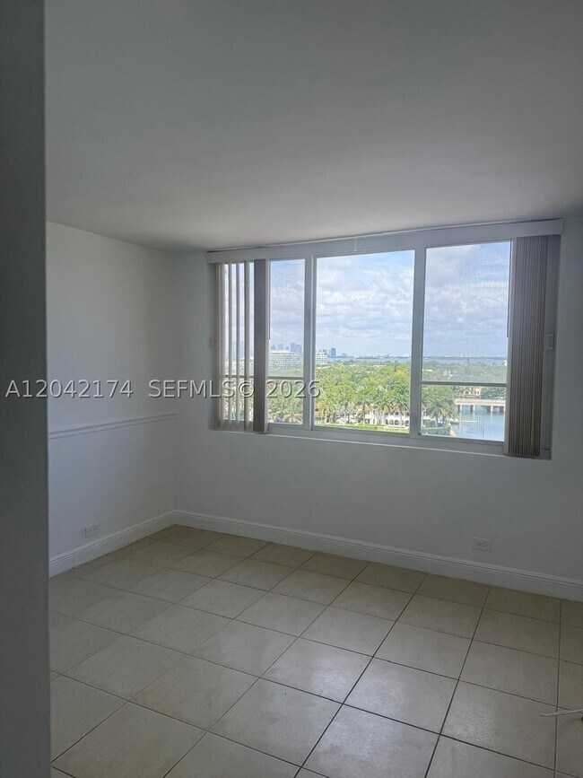 Building Photo - 5005 Collins Ave