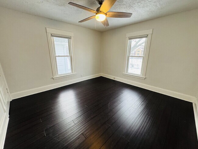 Building Photo - "Spacious 6-Bedroom Gem with Gleaming New Hardwood Floors in Minneapolis!"
