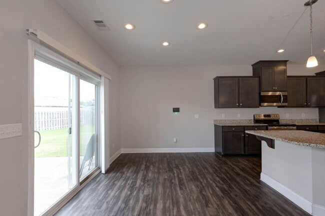 Building Photo - 4BR/3.5BA · 2,809 SF · Owner's Suite on Main · Fenced Yard · Midland, GA — $2,800/mo