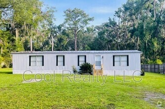 Building Photo - 7023 Melody Ln