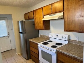 Building Photo - 1613 Windsong Ln