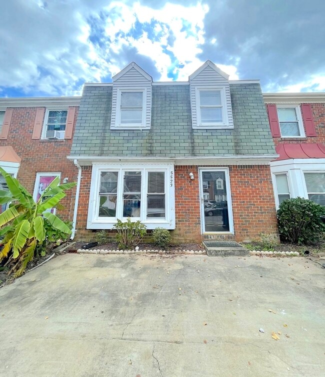 Primary Photo - Charming 3-Bedroom, 1.5-Bathroom Townhome ...